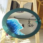 آینه دیواری با طراحی رزینی دریا و خوشنویسی