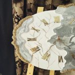 خرید ساعت دست‌ساز دفرمه سفید و طوسی