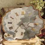 ساعت دیواری رزینی دفرمه لاکچری