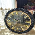 ساعت دیواری مشکی طلایی با طراحی کریستالی