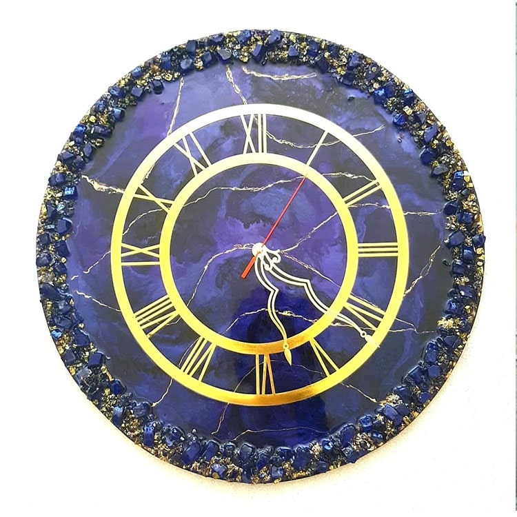 ساعت دیواری کریستالی بنفش و طلایی